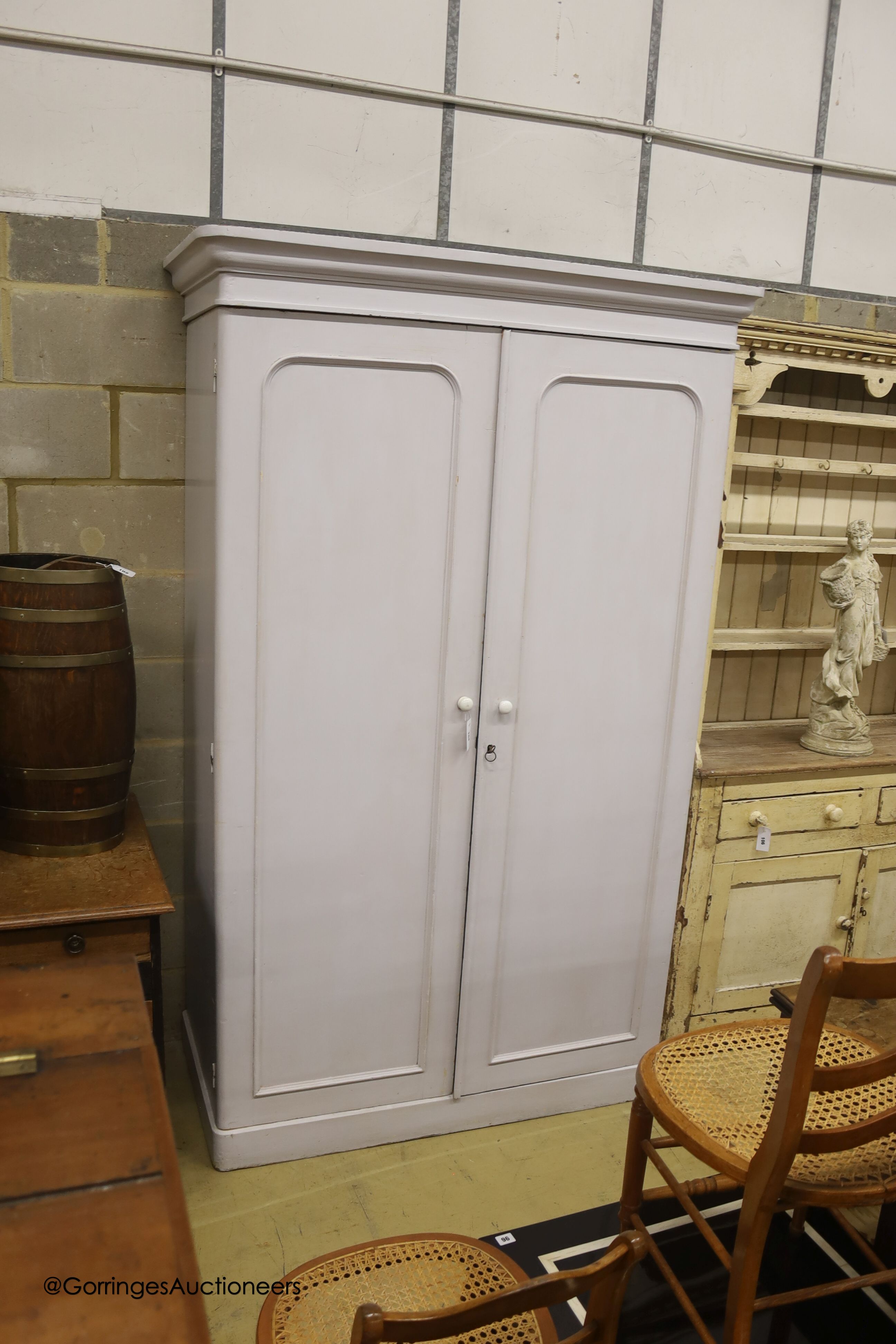 A Victorian painted two door pine wardrobe, width 128cm depth 63cm height 212cm